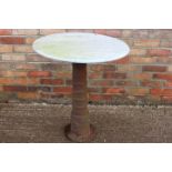 Cast iron table with marble top