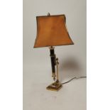 Brass and mahogany table lamp.