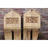 Two decorative wooden corbels.