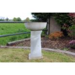 Contemporary stone bird bath .