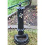 Cast iron free standing water tap.