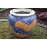 Multi coloured mosaic vase.