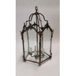 Brass and glass hall lantern.