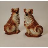 Pair of 19th C. Staffordshire dogs.