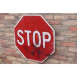 Octagonal enamel STOP advertising sign.