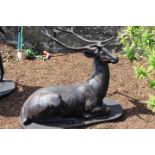 Good quality cast iron model of a seated Stag.