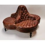 Deep buttoned leather Chesterfield convesation seat.