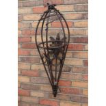 Decorative metal wall light.