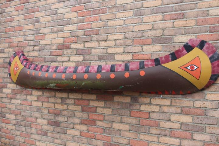 Wall feature in the form of a Native American canoe.
