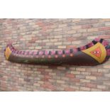 Wall feature in the form of a Native American canoe.