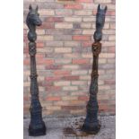 Pair of cast iron horses head tieing post.