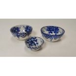 Set of three blue and white bowls.