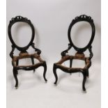 Pair of Victorian carved rosewood ladies chairs.