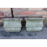 Pair of composition corbels.