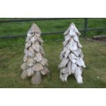 Pair of wooden models of trees.