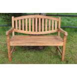 Teak two seater garden bench.