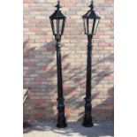 Pair of cast iron street lights.