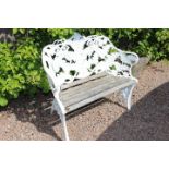 Decorative aluminium and wood garden seat.