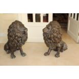 Pair of bronze models of seated Lions.