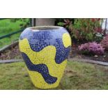 Multi coloured mosaic vase.