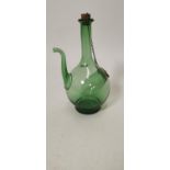 Green glass carafe.