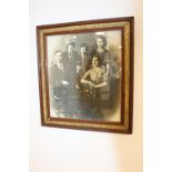 Black and white family portrait in mahogany and gilt frame.