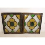 Pair of early 20th C. stained glass rosette windows.