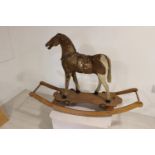 19th C. rocking horse on pine base.