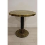 Brass embossed table .