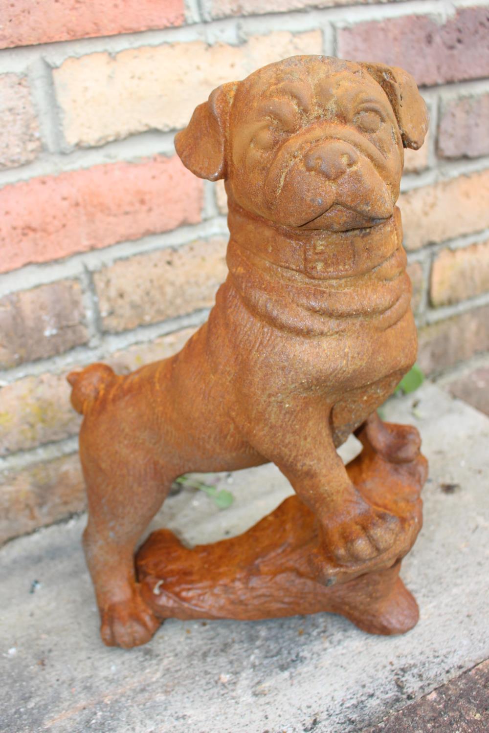 Cast iron bull dog door stop.