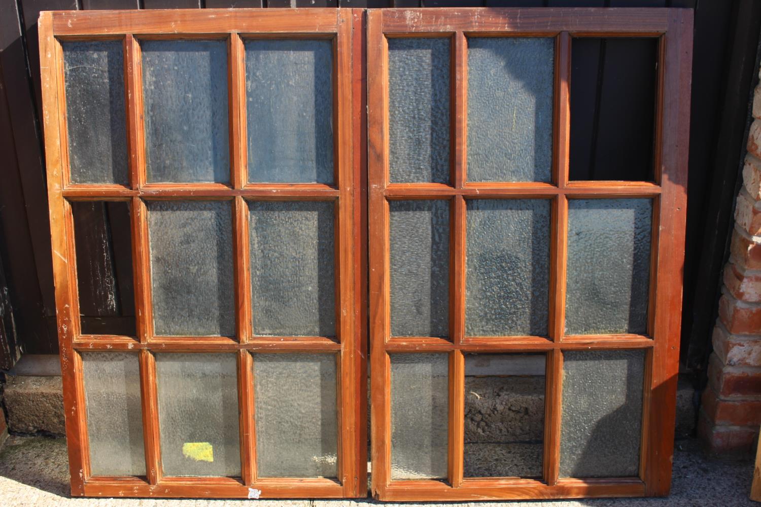 Pair of wooden glazed window frames.