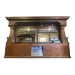 Late 19th C. oak Brunswick bar back.