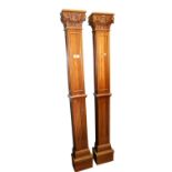 Pair of carved mahogany Corinthian columns.