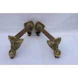 Set of four brass ball and claw bath feet.