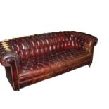 Early 20th C. deep buttoned leather chesterfield sofa.