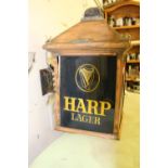 Copper Harp and Guinness triple sided hanging light up advertising sign.
