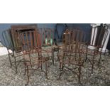 Set of six early 20th C. wrought iron garden chairs.