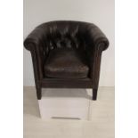 Good quality leather deep buttoned tub chair.