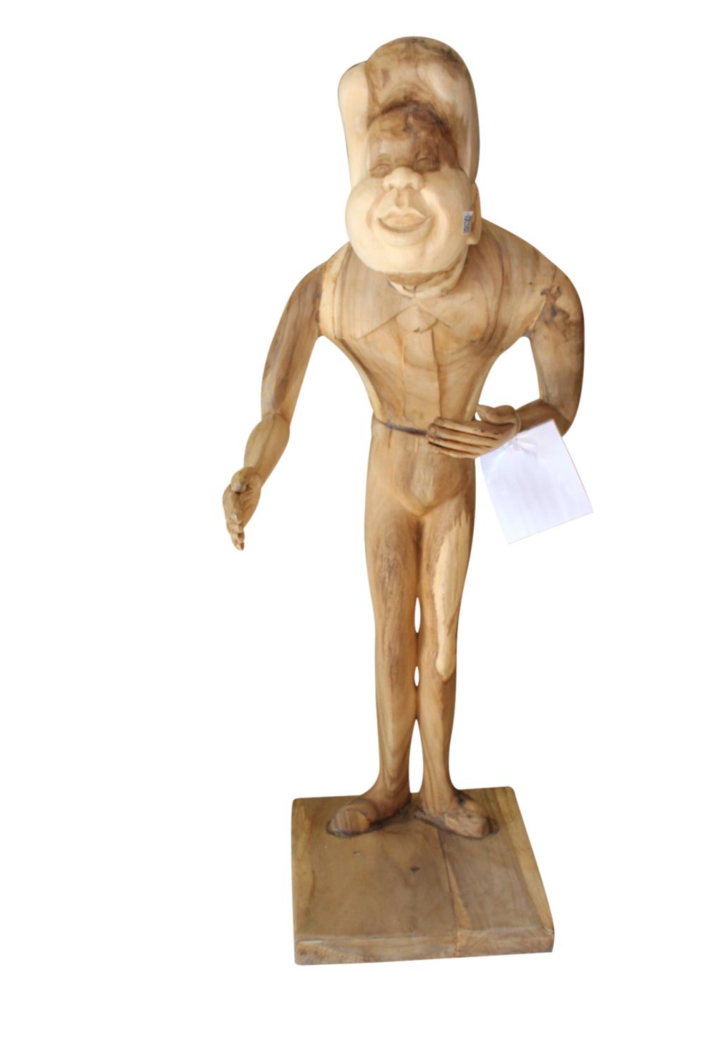 Carved wooden model of a man.