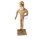 Carved wooden model of a man.
