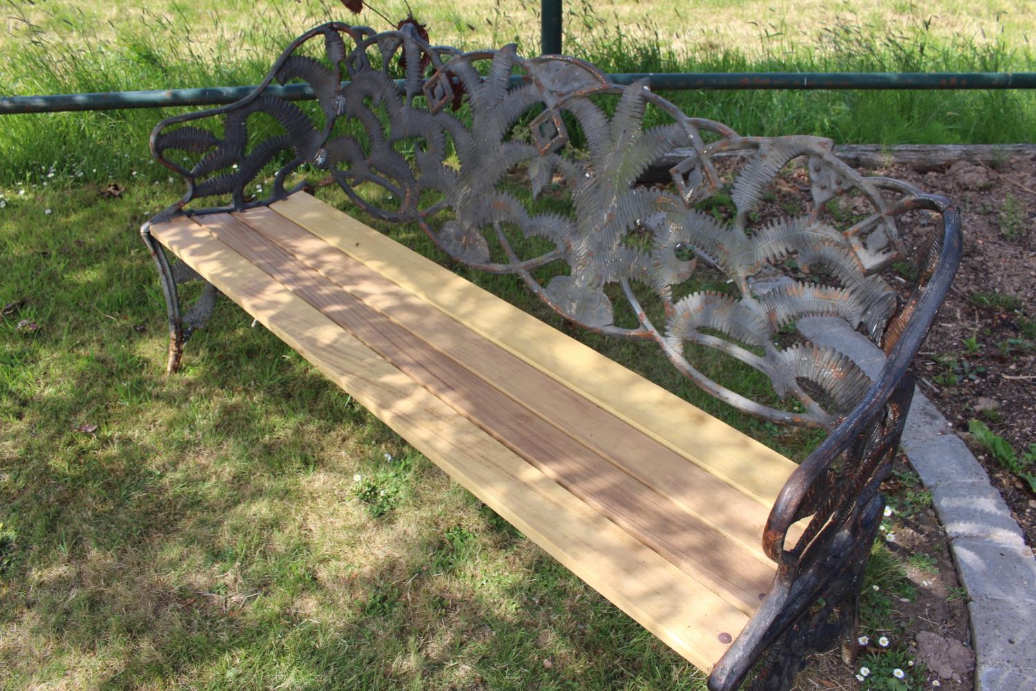 Cast iron three seater garden bench. - Image 2 of 2