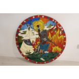 Unusual round Indian wall plaque.