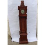 Mahogany grandmother clock.