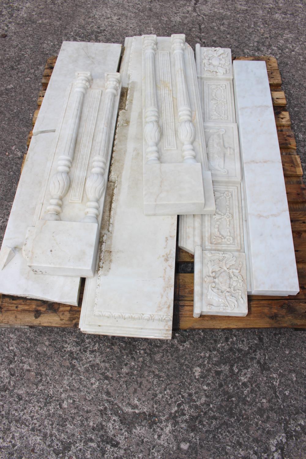 Two carved marble fire places with some damage.