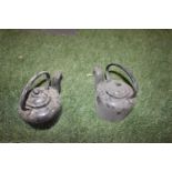 Pair of cast iron kettle.