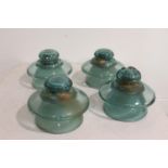 Set of four vintage glass conductors.