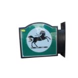 Double sided Black and Green Horse advertising sign.