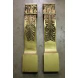 Pair of wooden gold painted columns decorated with acanthus leaf.