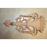 Carved mahogany wall plaque.