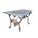 Cast iron garden table with marble top.